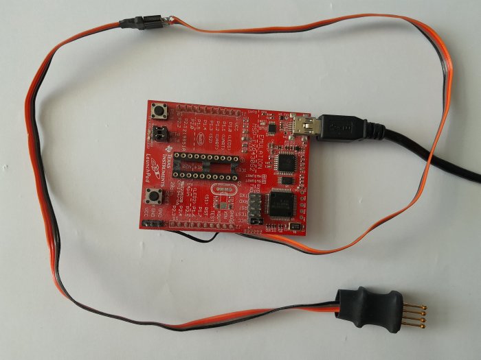 A photo of MSP-EXP430G2 with 'SPI by wire' wires and pogo pin extension