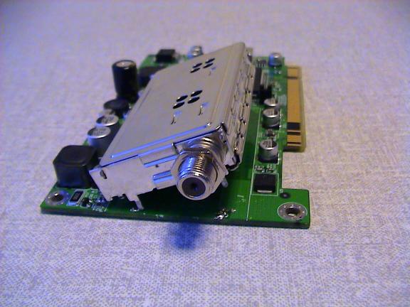 tuner lifted, hanging by the signal pins