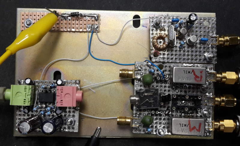 A photo of all three boards mounted on a metal plate